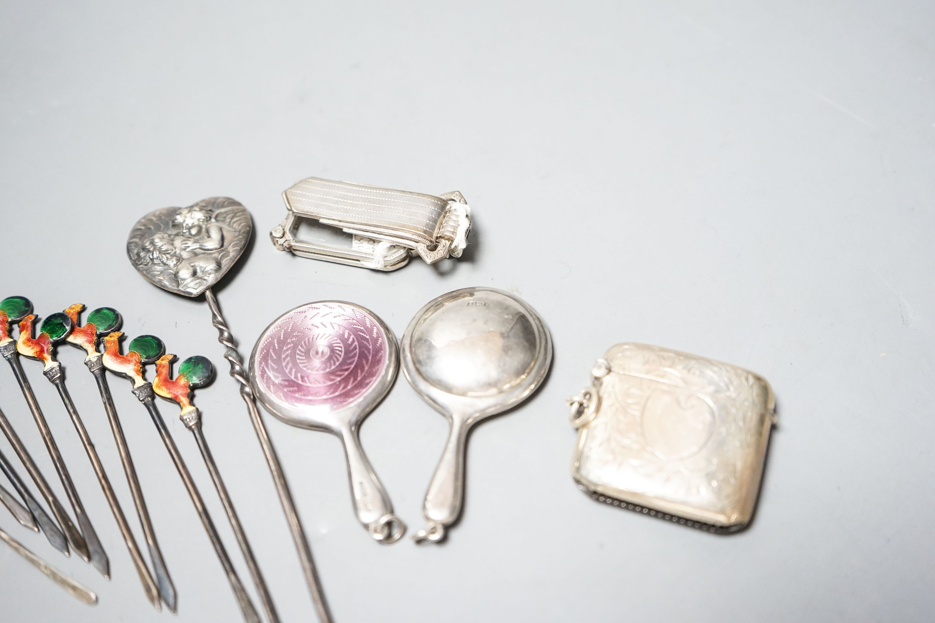 Small silver and white metal including enamelled handbag mirror and one other, a vesta case enamelled cocktail sticks, two metal lorgnettes etc.